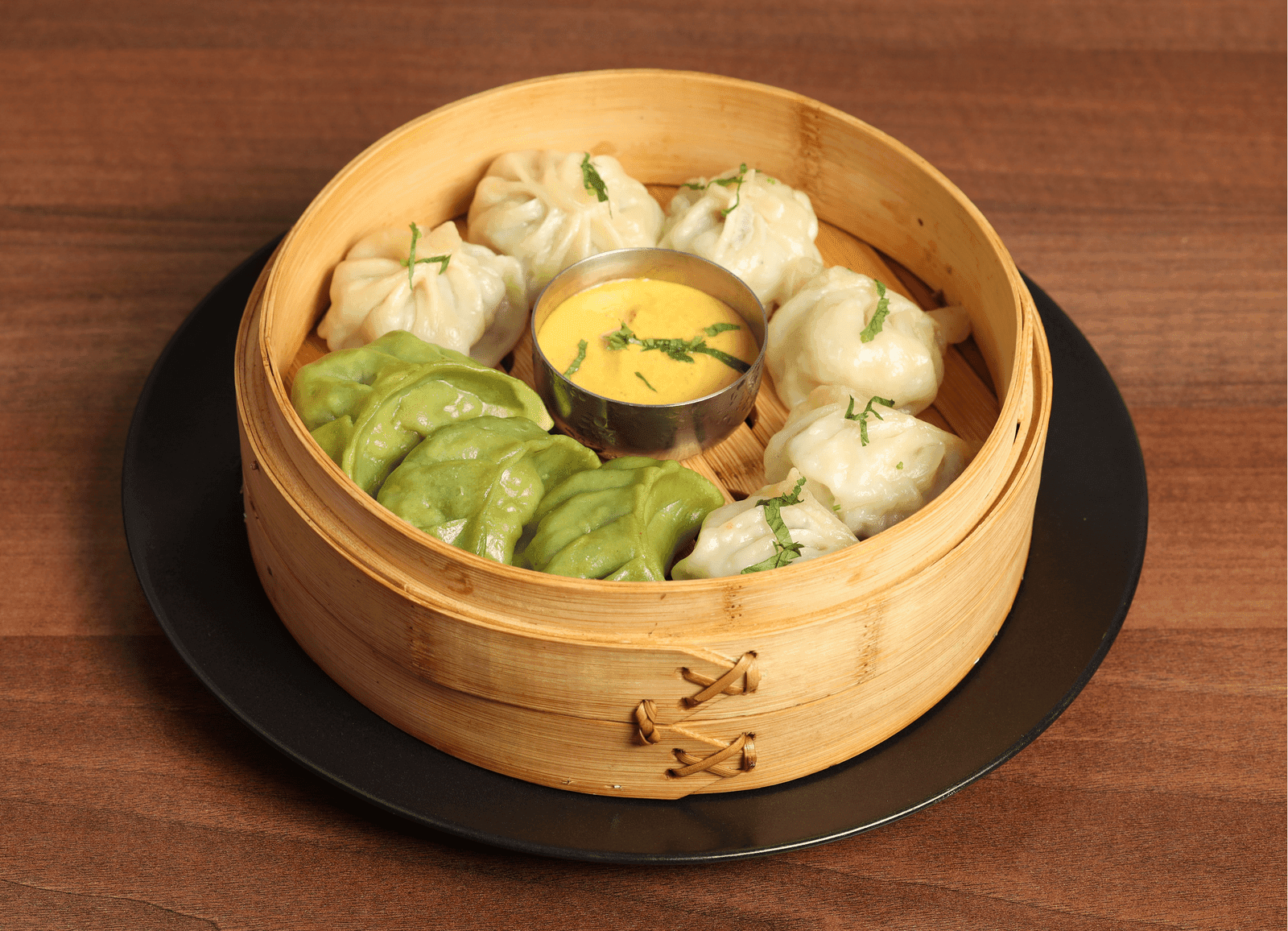 Steamed momos with tomato sesame chutney | Annapurna East Sheen Nepalese Restaurant
